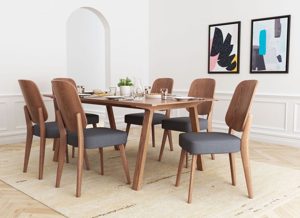 A modern styled dining set made from wood and uphoslery from Zuo Modern
